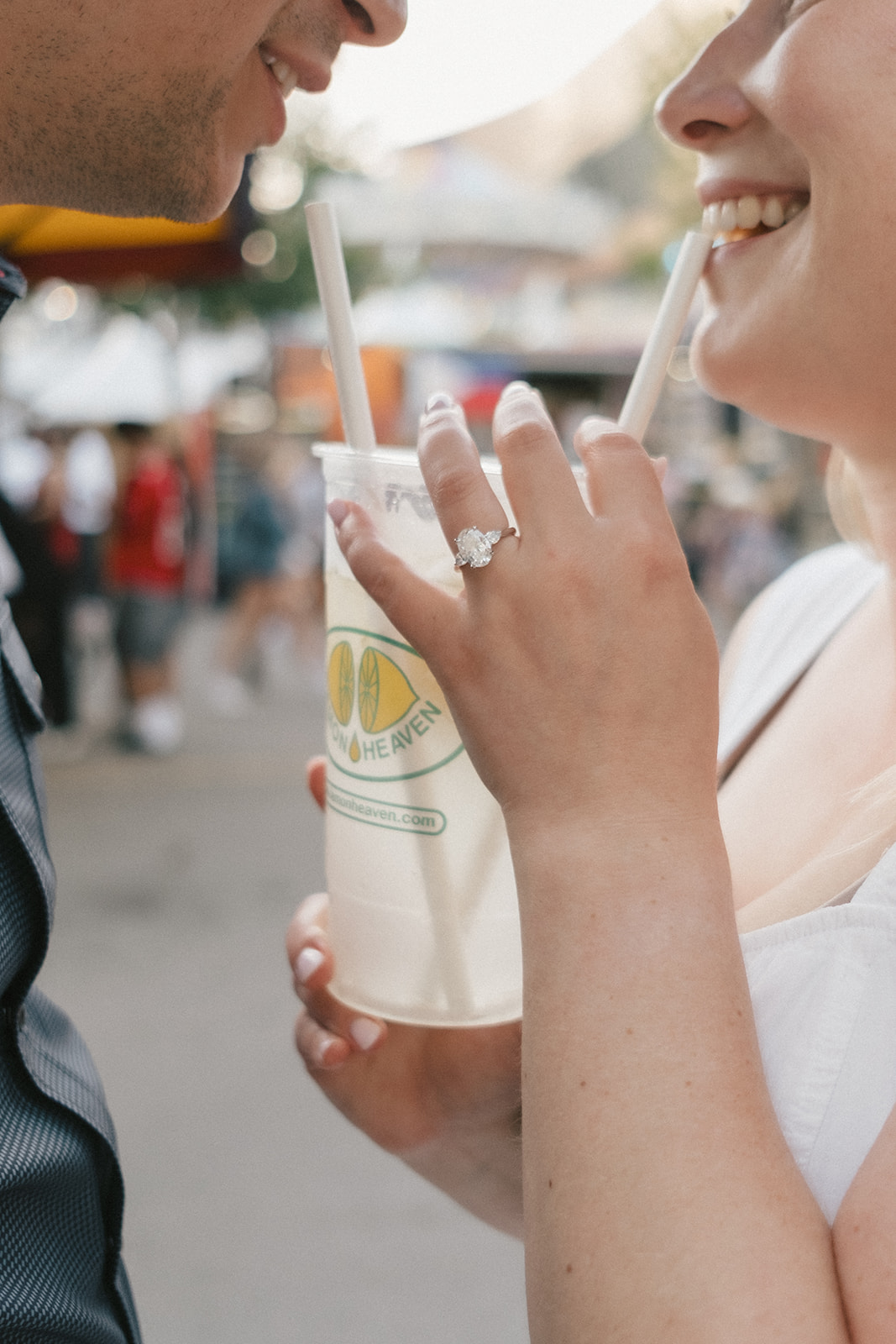 Sharing a lemonade, ring in view